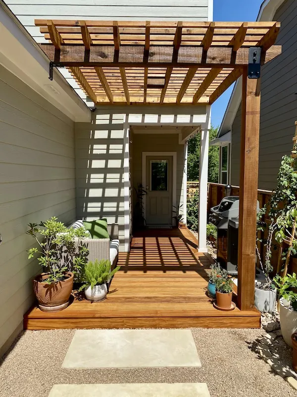Garapa hardwood deck with attached cedar pergola
