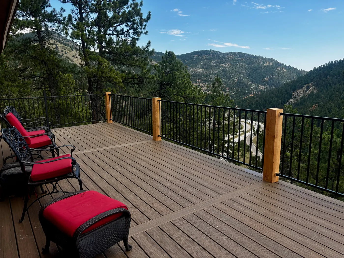 Trex composite deck built on steep terrain in Morrison, CO, overlooking the mountains