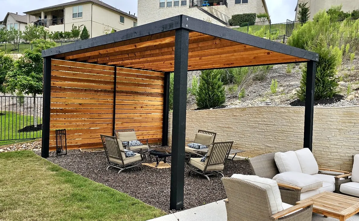 Two-tone pergola with cedar privacy wall